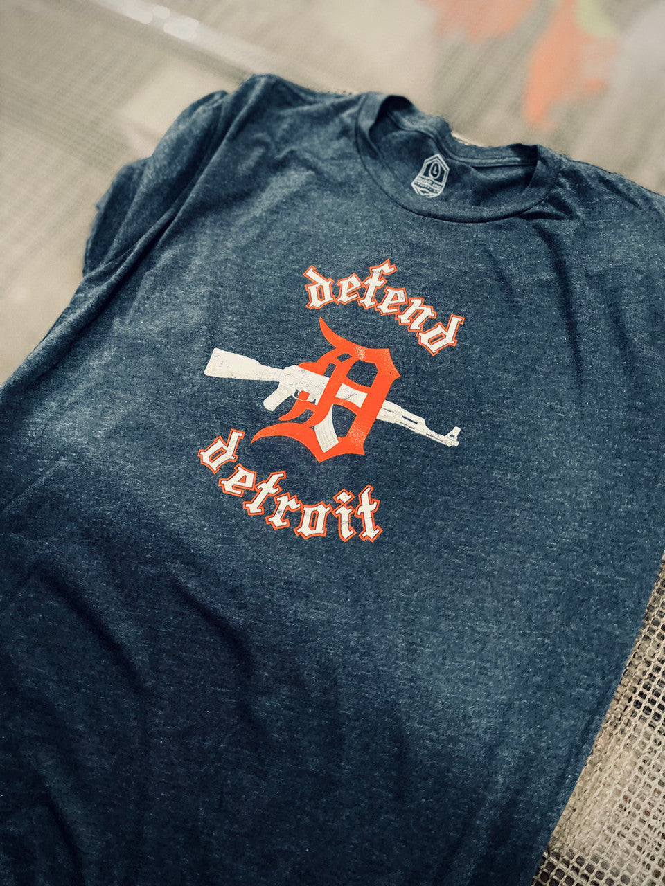 DEFEND DETROIT -
We grew up in Michigan, we live in Michigan, and no matter where we go, our roots will always be in Michigan. Like the people that wear our designs, Most of us in Michigan are independent, and free thinking. We hunt, we shoot, and we not only protect our land, but our people. Defend Detroit repesents the no nonsense (Dont fuck with us) attitude that is Michigan. And if we want to take over Canada.. we will.